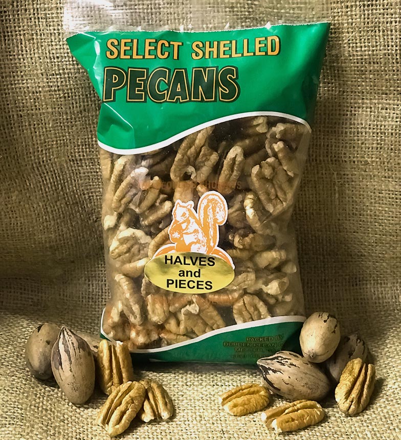 One-pound bag of shelled pecan halves and pieces displayed upright on a burlap background